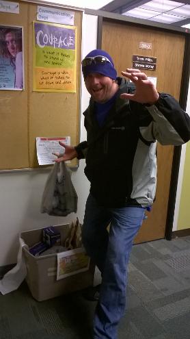 Donating to the SLCC food drive. 
